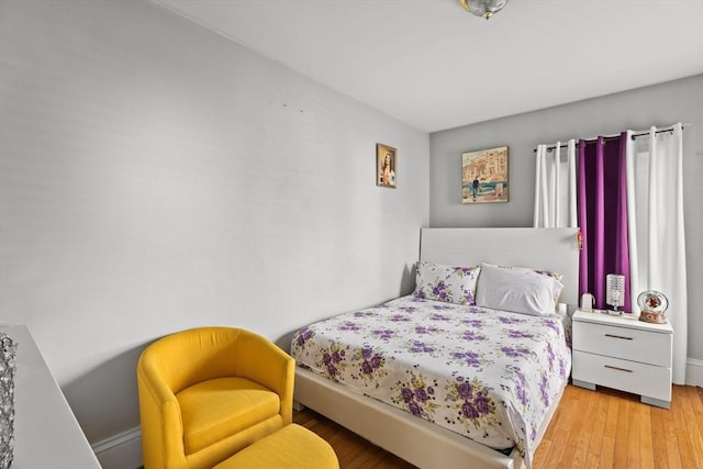 bedroom featuring hardwood / wood-style flooring