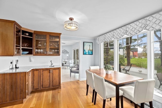 dining room featuring light wood-style flooring