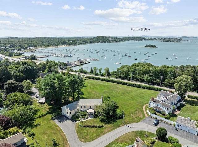 birds eye view of property featuring a water view
