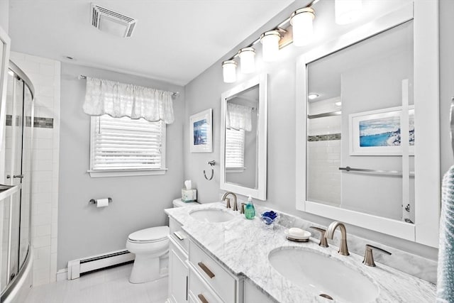full bath with visible vents, a sink, a baseboard radiator, and toilet