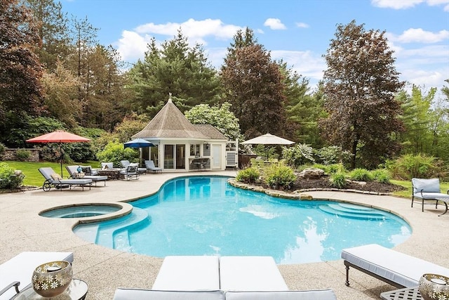 18 Connors Way, Leominster, MA 01453 - view of swimming pool with a storage structure, a patio area, an outbuilding, and a pool with connected hot tub
