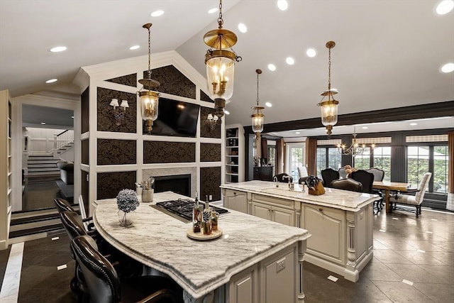 18 Connors Way, Leominster, MA 01453 - kitchen with a spacious island, lofted ceiling, healthy amount of natural light, a breakfast bar area, and recessed lighting