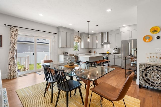 34 Sumner St Unit 34, Norfolk, MA 02056 - dining area featuring light wood finished floors and recessed lighting