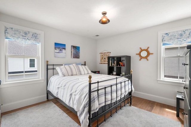 34 Sumner St Unit 34, Norfolk, MA 02056 - bedroom with wood finished floors and baseboards