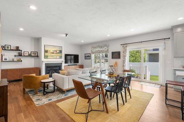 34 Sumner St Unit 34, Norfolk, MA 02056 - dining room with recessed lighting, light wood-type flooring, and a glass covered fireplace
