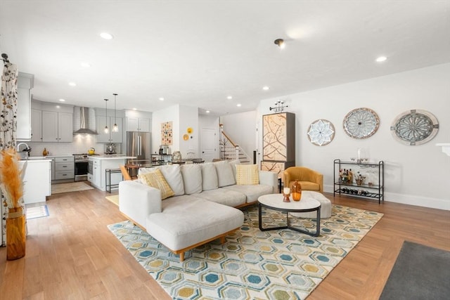 34 Sumner St Unit 34, Norfolk, MA 02056 - living area featuring recessed lighting, stairway, and light wood-type flooring