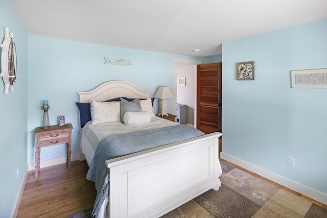 bedroom featuring wood-type flooring