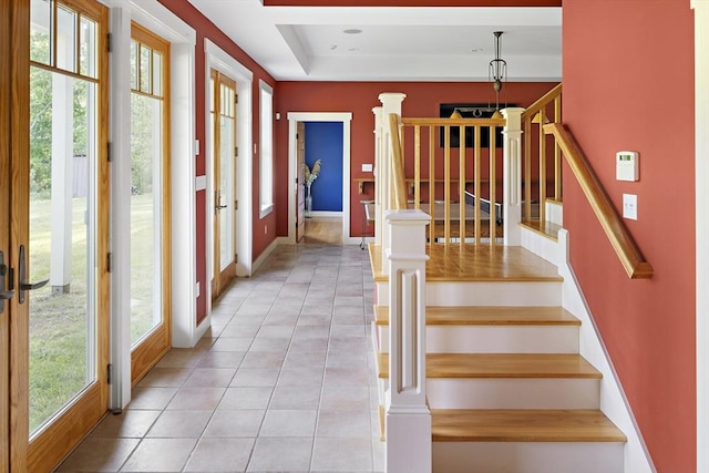 staircase with tile patterned floors