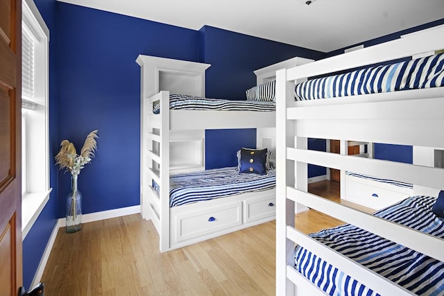 bedroom with light hardwood / wood-style flooring