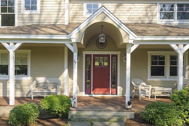 property entrance with covered porch