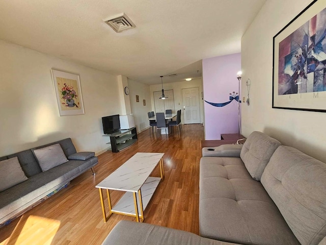 living room with hardwood / wood-style floors