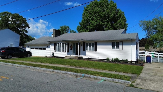 344 Frieda St, New Bedford, MA 02744 - ranch-style house featuring a garage and a chimney