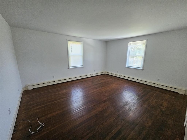 344 Frieda St, New Bedford, MA 02744 - spare room with plenty of natural light, dark wood-type flooring, baseboards, and a baseboard radiator