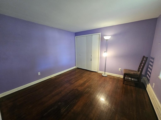 344 Frieda St, New Bedford, MA 02744 - unfurnished bedroom with wood finished floors, baseboards, and a closet