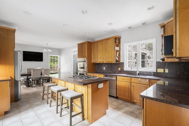 6 Paddock Dr, Lincoln, RI 02865 - kitchen with a sink, appliances with stainless steel finishes, open shelves, a center island, and a chandelier