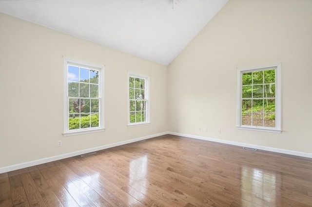 6 Paddock Dr, Lincoln, RI 02865 - unfurnished room with hardwood / wood-style floors, baseboards, and high vaulted ceiling