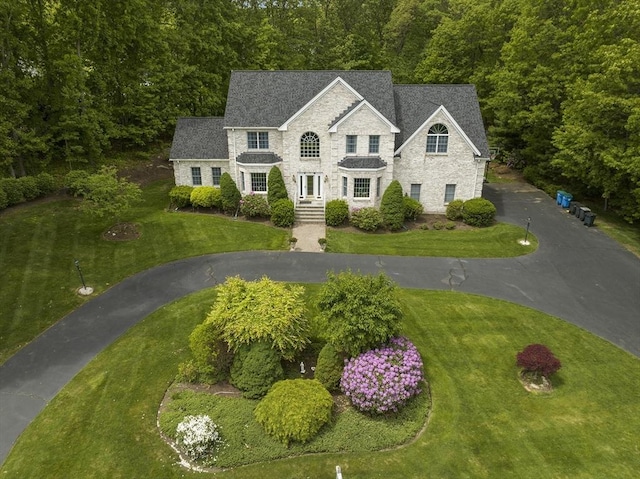 6 Paddock Dr, Lincoln, RI 02865 - view of front of property featuring a front lawn and stone siding