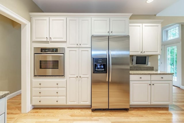 7 Brimfield Way, Westfield, MA 01085 - kitchen featuring stainless steel appliances, white cabinets, light stone counters, light wood-style flooring, and recessed lighting