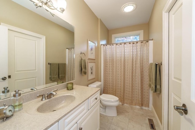 7 Brimfield Way, Westfield, MA 01085 - bathroom with vanity, toilet, a shower with shower curtain, and tile patterned floors