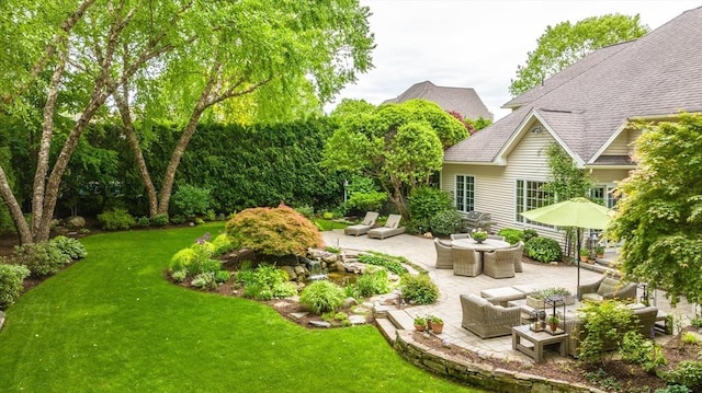 7 Brimfield Way, Westfield, MA 01085 - view of grassy yard with a patio and an outdoor living space