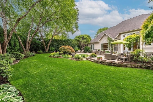 7 Brimfield Way, Westfield, MA 01085 - view of green lawn with outdoor lounge area and a patio