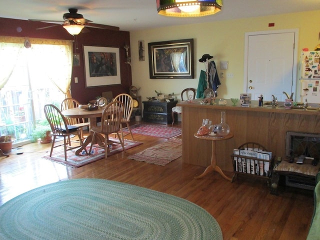 interior space featuring ceiling fan and hardwood / wood-style floors