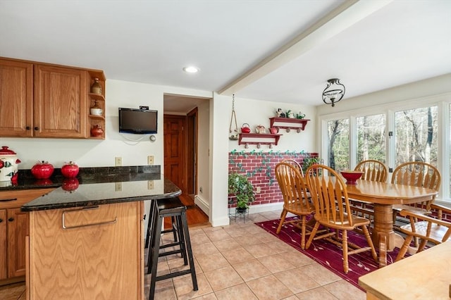 view of tiled dining space