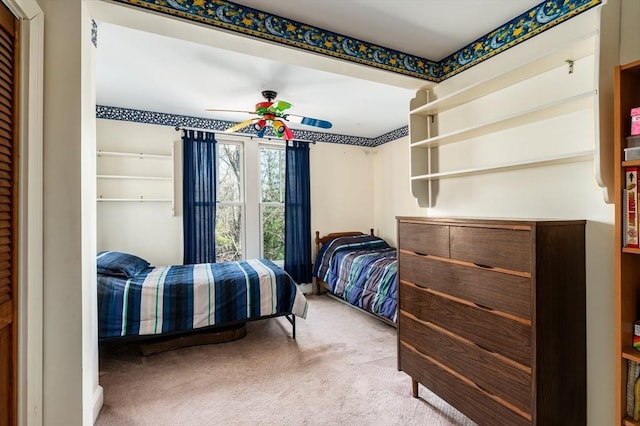 bedroom featuring carpet flooring and ceiling fan