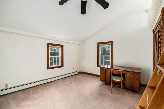 unfurnished office featuring ceiling fan, light colored carpet, vaulted ceiling, and a baseboard heating unit