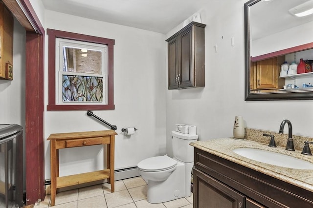 29 Shady Ave, Westminster, MA 01473 - bathroom with a baseboard radiator, vanity, toilet, and tile patterned floors