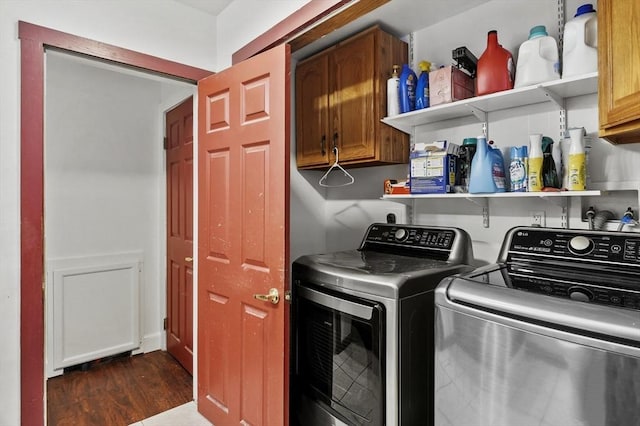 29 Shady Ave, Westminster, MA 01473 - laundry area with cabinet space, washer and clothes dryer, and dark wood-style flooring