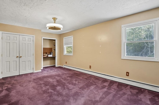 29 Shady Ave, Westminster, MA 01473 - unfurnished bedroom with carpet floors, multiple windows, baseboard heating, and a textured ceiling