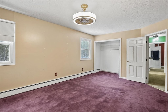 29 Shady Ave, Westminster, MA 01473 - unfurnished bedroom with carpet floors, a baseboard radiator, a closet, and a textured ceiling