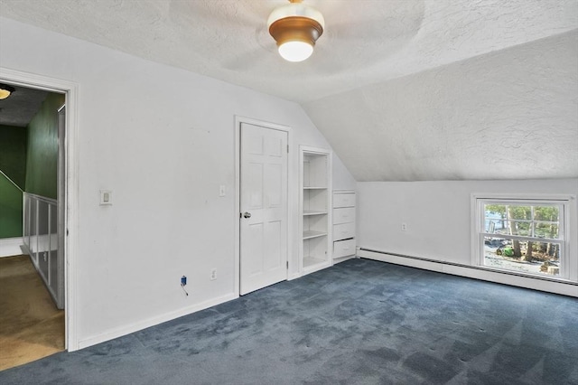 29 Shady Ave, Westminster, MA 01473 - bonus room featuring a textured ceiling, lofted ceiling, a baseboard heating unit, baseboards, and dark carpet