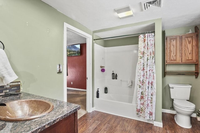 29 Shady Ave, Westminster, MA 01473 - full bath with shower / bath combination with curtain, visible vents, vanity, wood finished floors, and baseboards