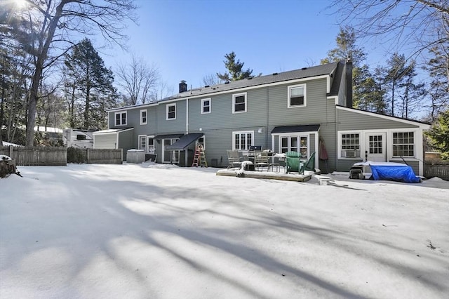 29 Shady Ave, Westminster, MA 01473 - snow covered rear of property featuring a chimney and fence