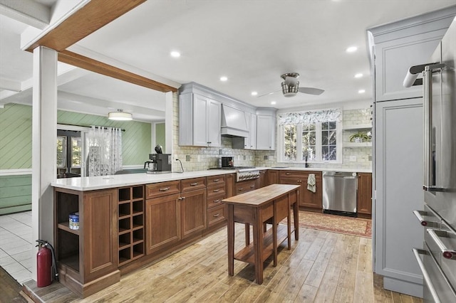 29 Shady Ave, Westminster, MA 01473 - kitchen featuring open shelves, stainless steel appliances, light countertops, decorative backsplash, and premium range hood