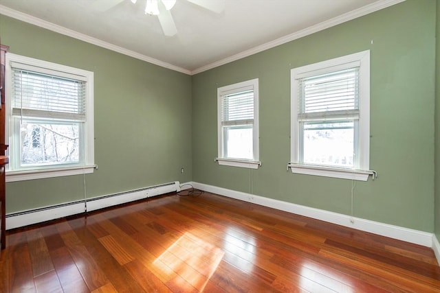 unfurnished room featuring wood-type flooring, a baseboard radiator, and crown molding