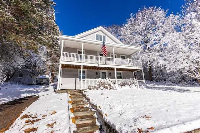 view of front of home with a balcony