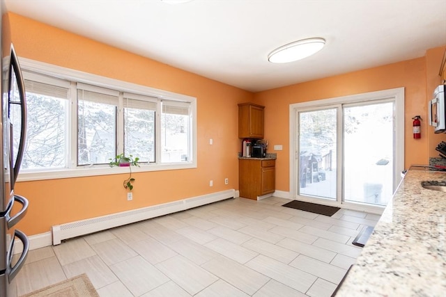 doorway with a baseboard radiator