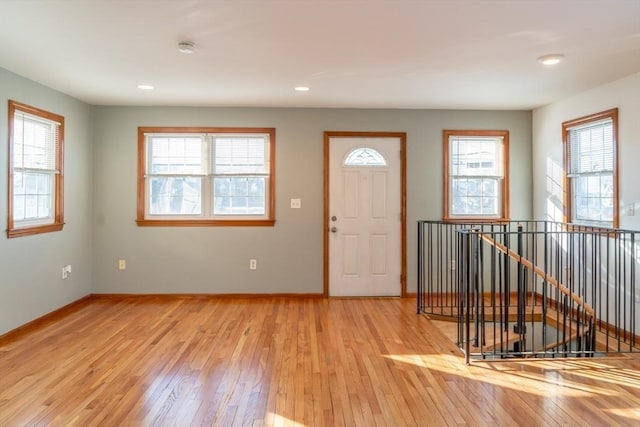 entryway with light hardwood / wood-style floors