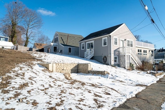 view of snow covered house