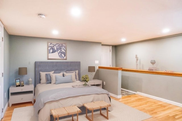 bedroom with light wood-type flooring