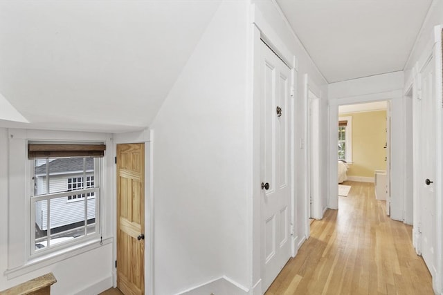14 Thoreau St, Concord, MA 01742 - hallway with light wood-type flooring and baseboards