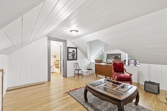 14 Thoreau St, Concord, MA 01742 - living area with wood finished floors, wood walls, and lofted ceiling