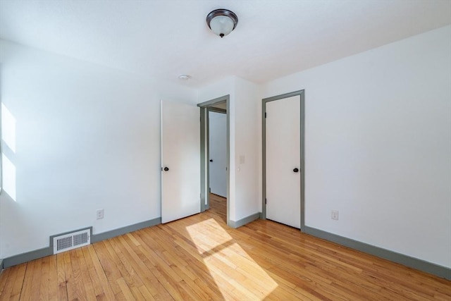 empty room featuring light wood-type flooring