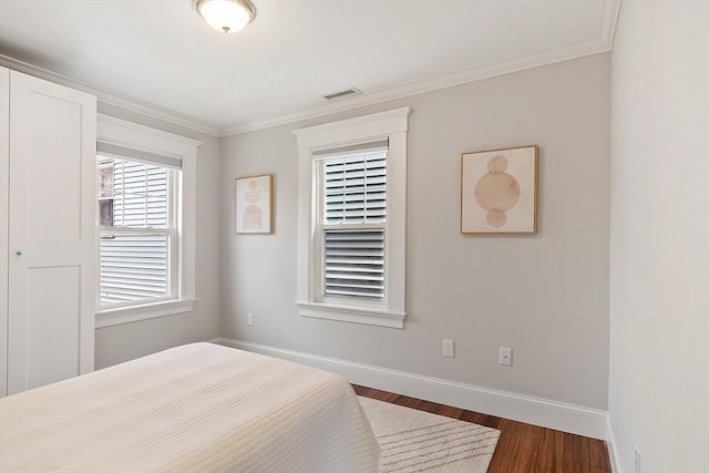 24 Lemon St Unit 2, Salem, MA 01970 - bedroom featuring dark wood-style floors and ornamental molding