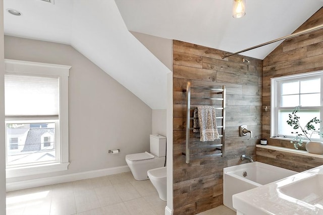 24 Lemon St Unit 2, Salem, MA 01970 - bathroom featuring lofted ceiling, a tub, tiled shower, and a bidet