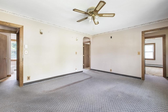 10 Hazel Plz, Uxbridge, MA 01569 - carpeted spare room featuring a baseboard radiator, healthy amount of natural light, a ceiling fan, and baseboards