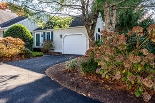 exterior space featuring a garage